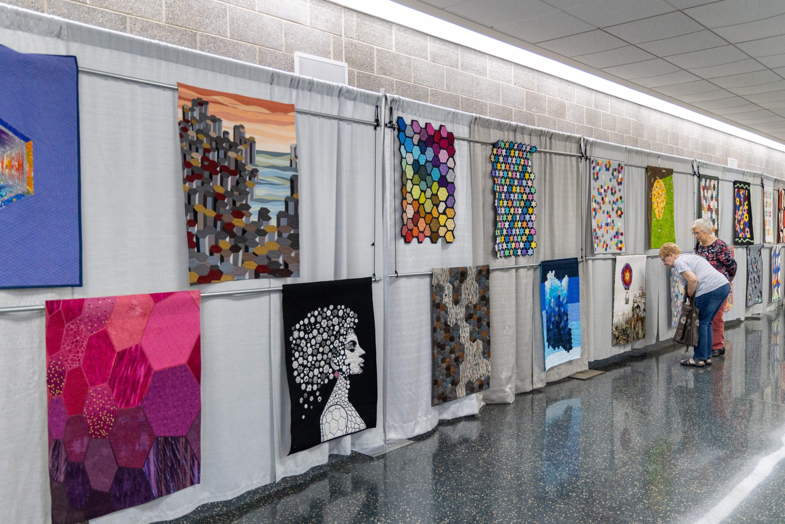 exhibit of hexagon quilts