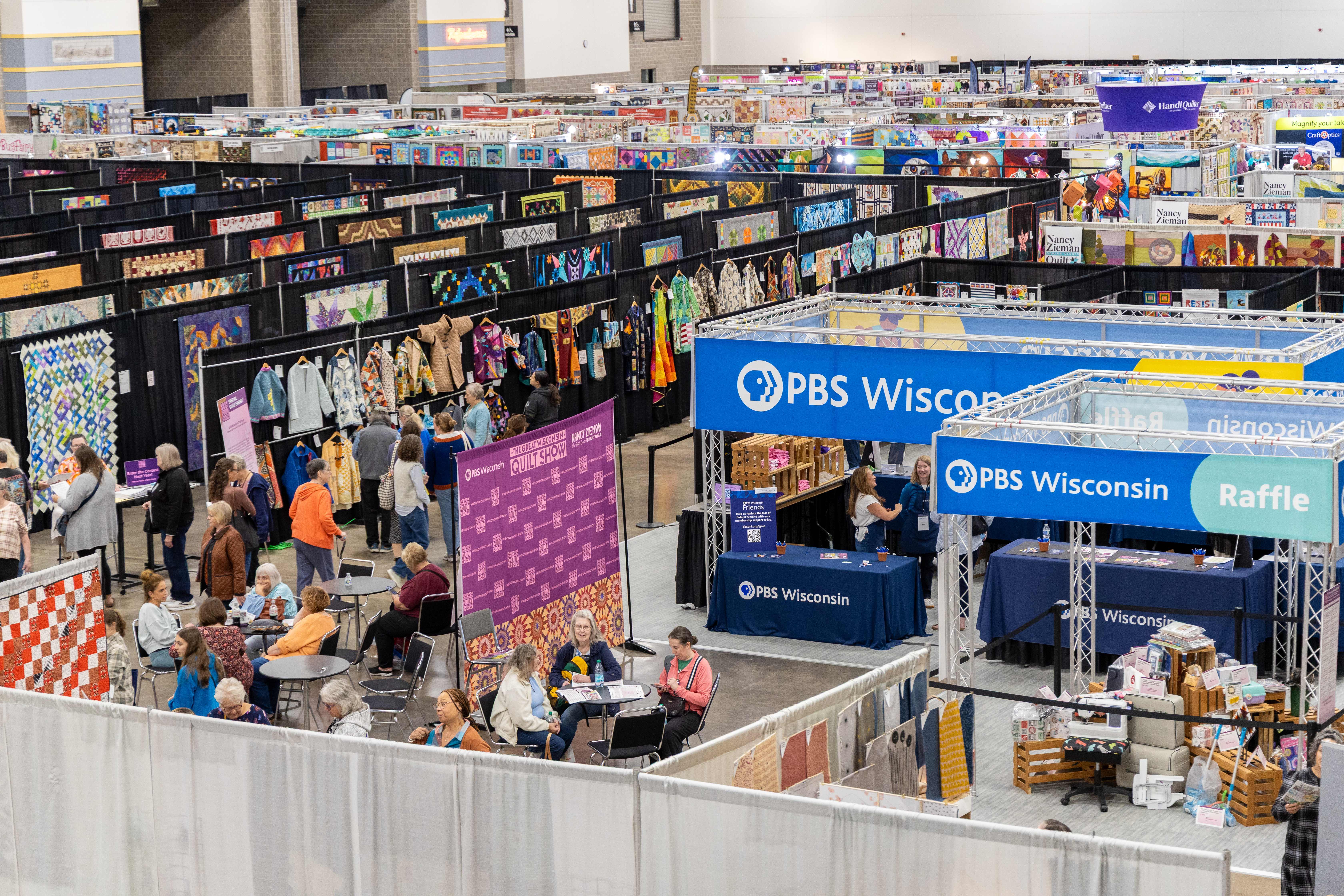 view of exhibition gall with PBS Wisconsin Booth and Quilt Contest Exhibit